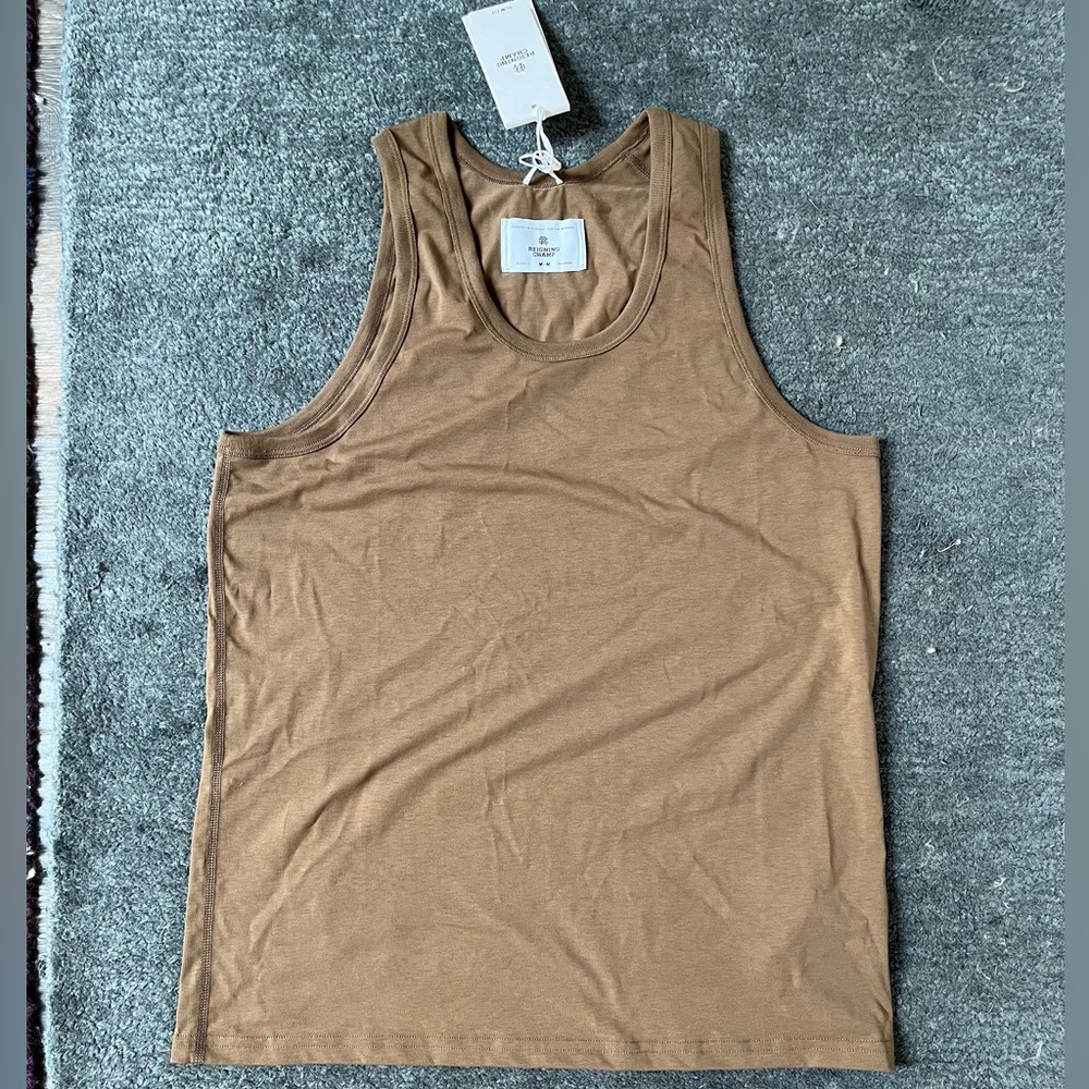 Reigning champ tank top. size medium. slim fit. brownish color